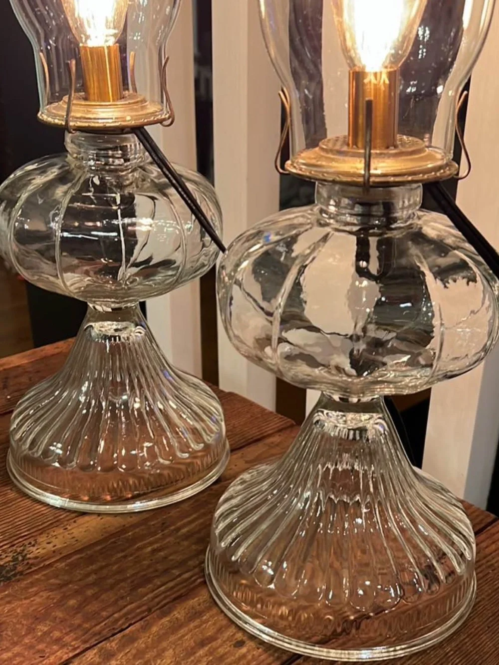 Pair of vintage clear glass converted oil lamps